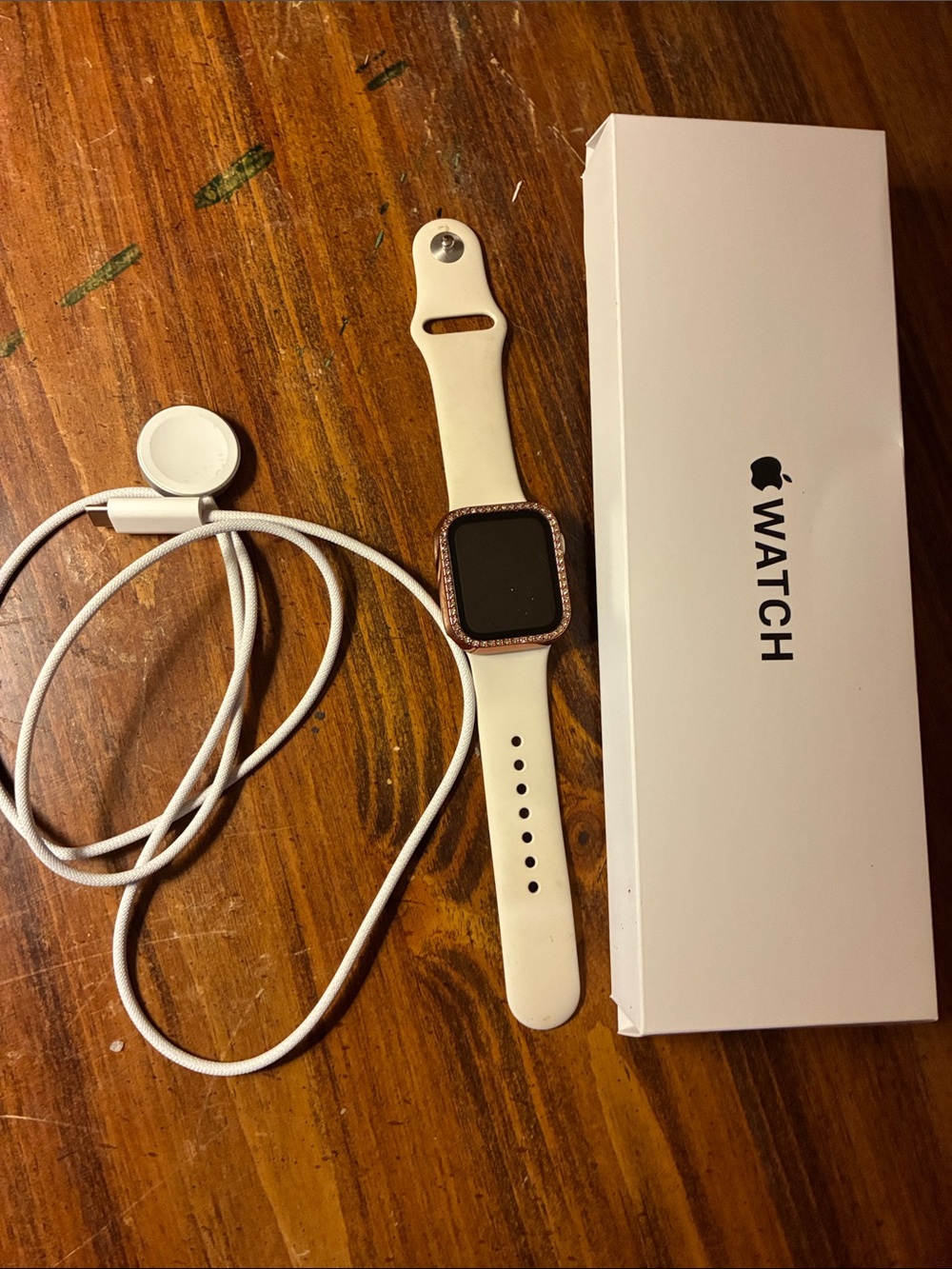 Apple SE 3 White Silicone Smartwatch with Rose Gold Crystal Bezel